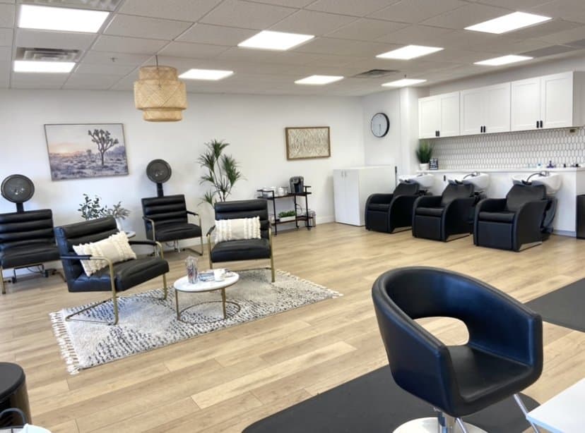 The Salon Lounge interior — quiet, residential, warm light